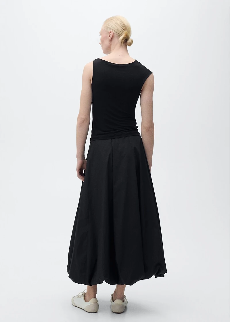 Asymmetrical top with metallic appliqué