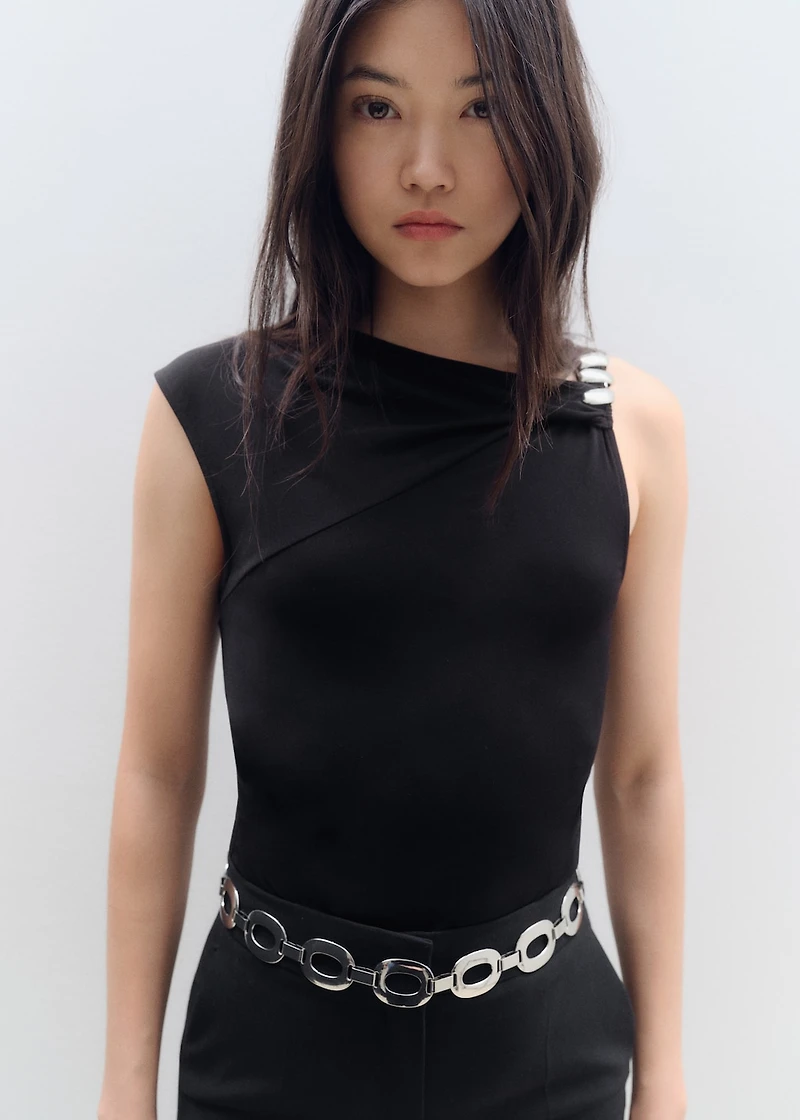 Asymmetrical top with metallic appliqué