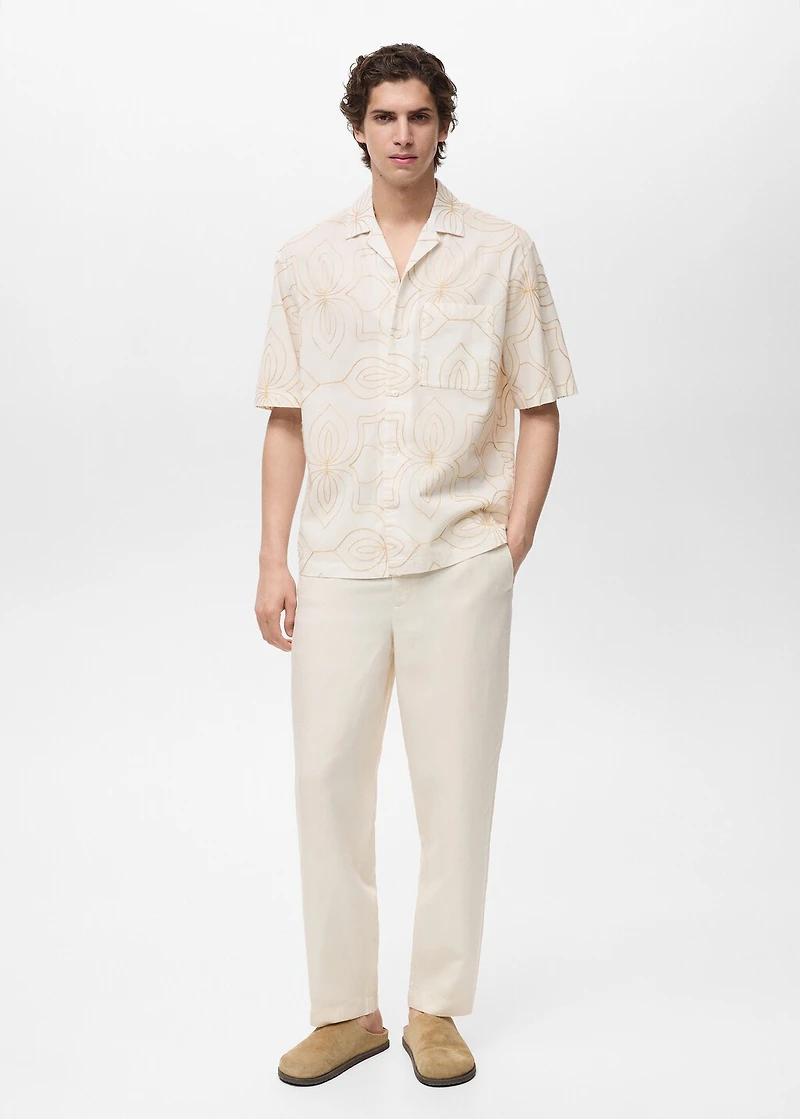 Shirt with embroidered bowling collar