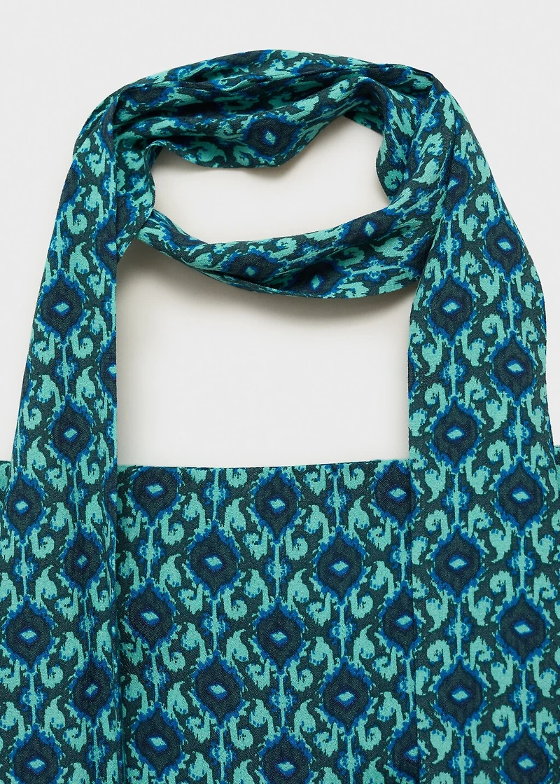 Printed jumpsuit with bow