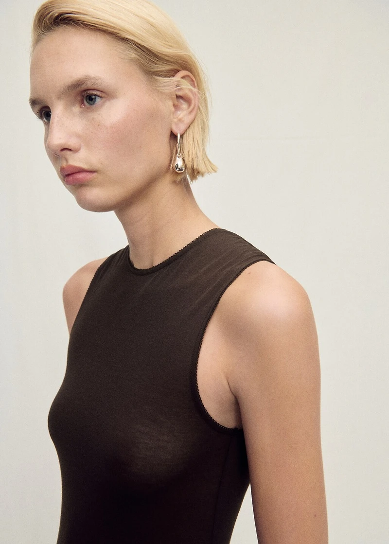 Semi-transparent dress with puffed hem