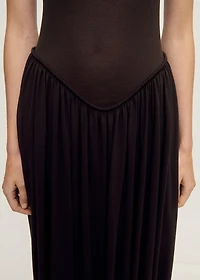 Semi-transparent dress with puffed hem