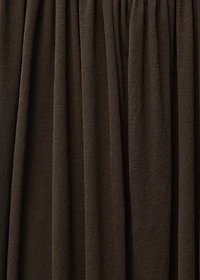 Semi-transparent dress with puffed hem