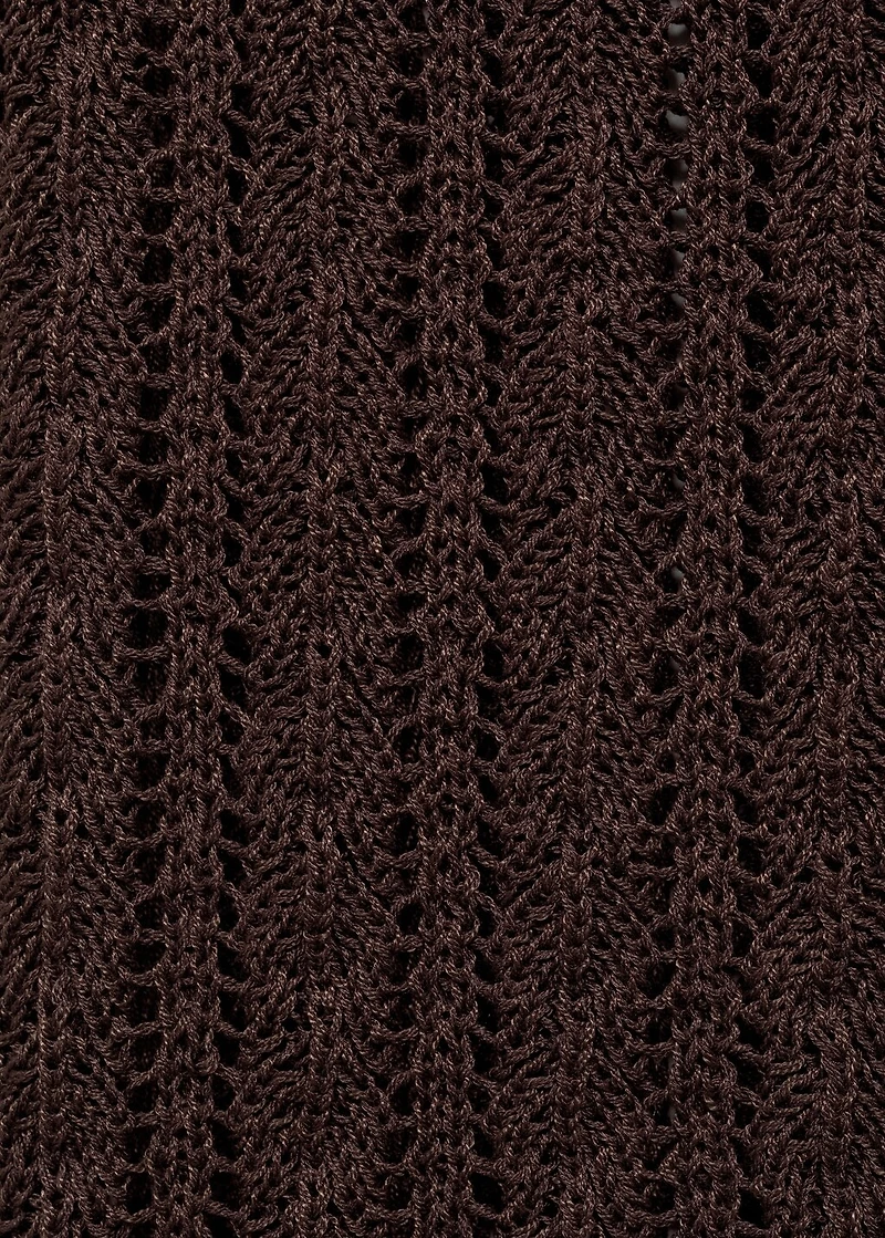 Knitted vest with bow closure