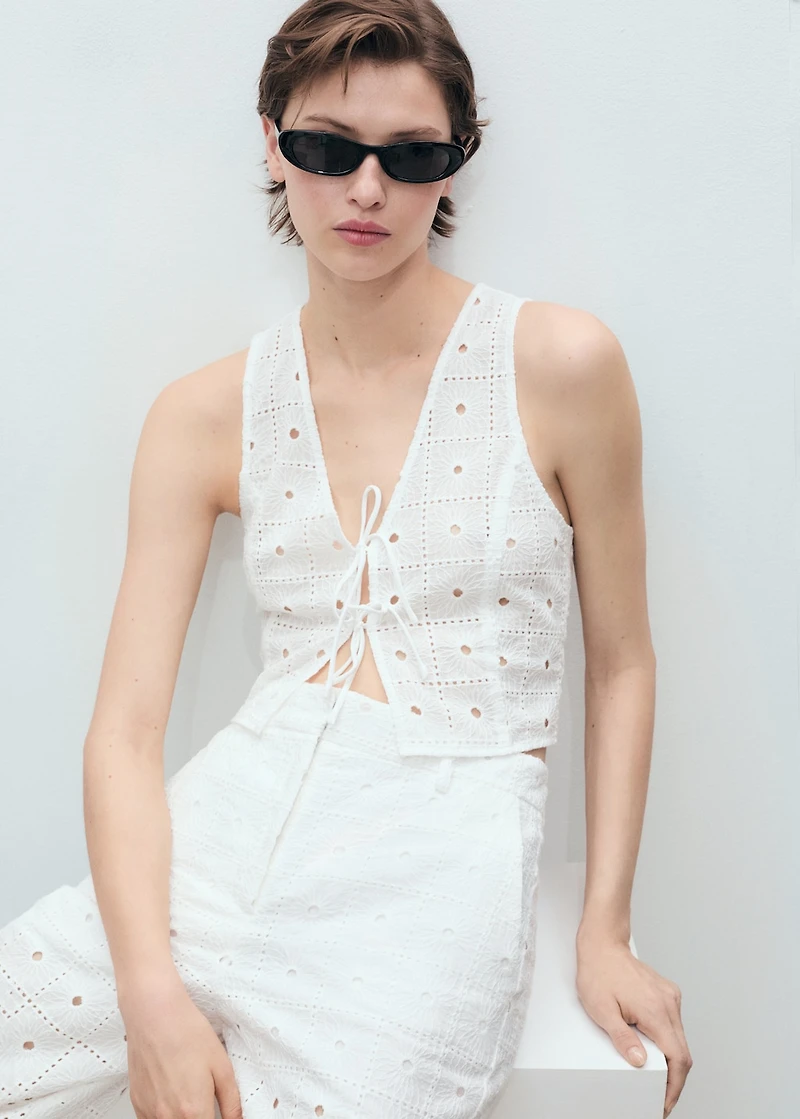 Embroidered cotton vest with bows