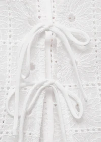 Embroidered cotton vest with bows