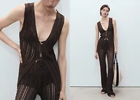 Knitted vest with bow closure