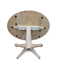 International Concepts 42" Round Dual Drop Leaf Pedestal Table