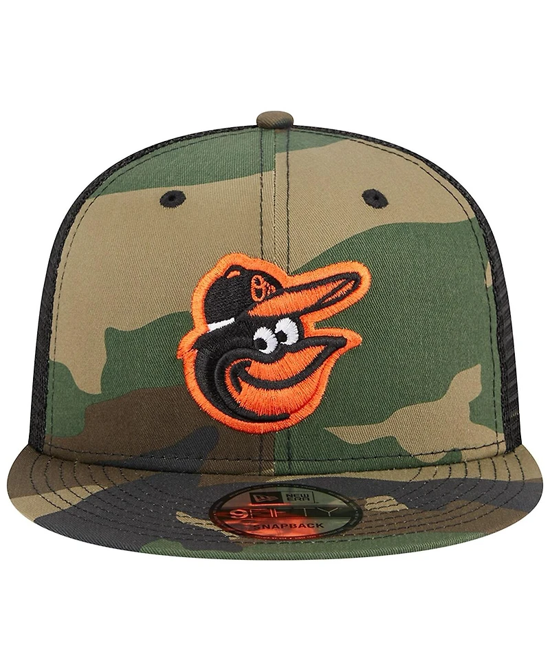 Men's New Era Camo Baltimore Orioles Woodland Camo Trucker 9FIFTY Snapback Hat