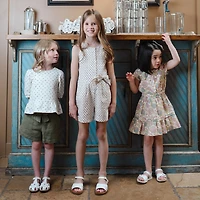 Hope & Henry Girls Bubble Sleeve Knit Peplum Top