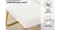 White armless sofa chair with gold legs. Versatile for any space