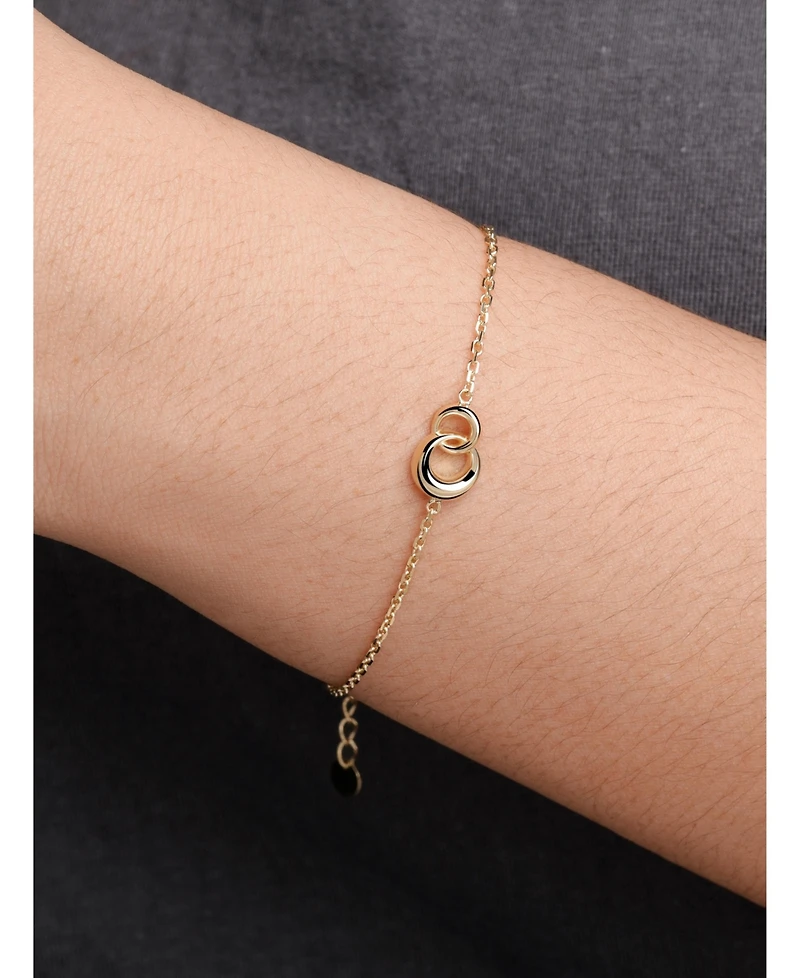 Devata Love Knot Chain Bracelet in 14K Gold, 6.5 in adj to 7.5 in, approx. 2.7 grams.