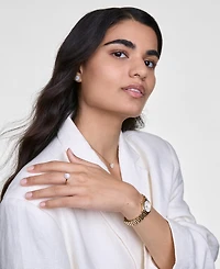 Daniel Wellington Women's Analog Gold-Tone Stainless Steel Watch