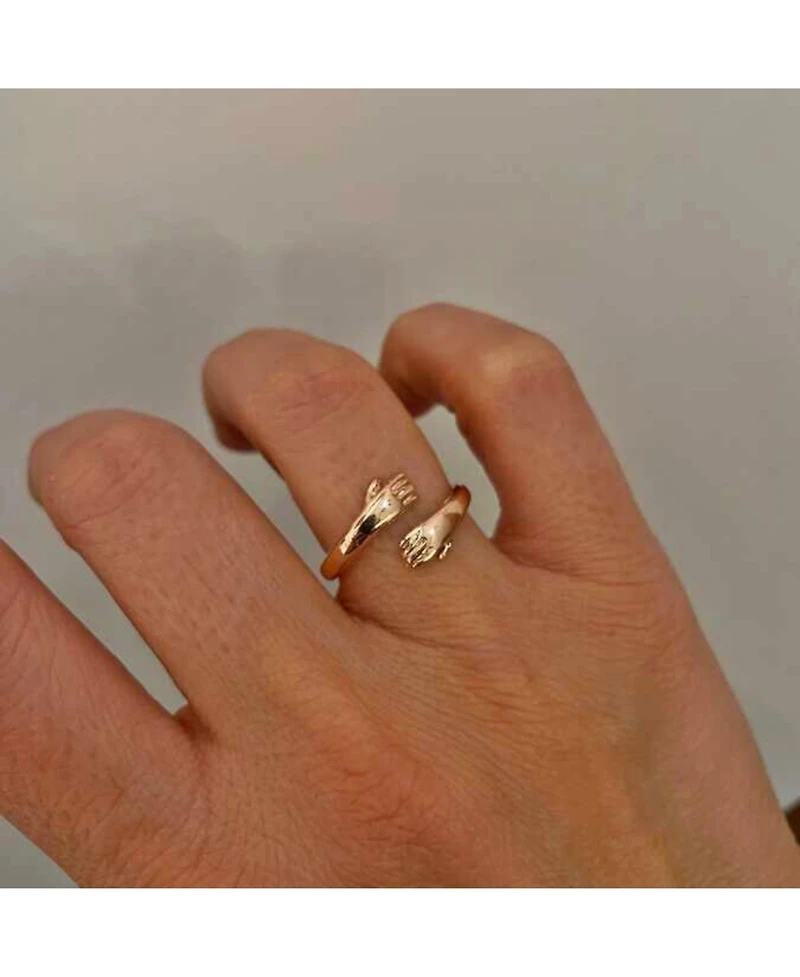 Spero London Hug Ring With Hands Sterling Silver and Gold Plated