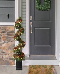 Puleo 4' Pre-Lit Artificial Potted Swirl Tree Adorned with Red Berries