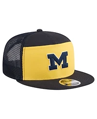 New Era Men's Black/Maize Michigan Wolverines Outdoor Wide Panel 9FIFTY Snapback Trucker Hat