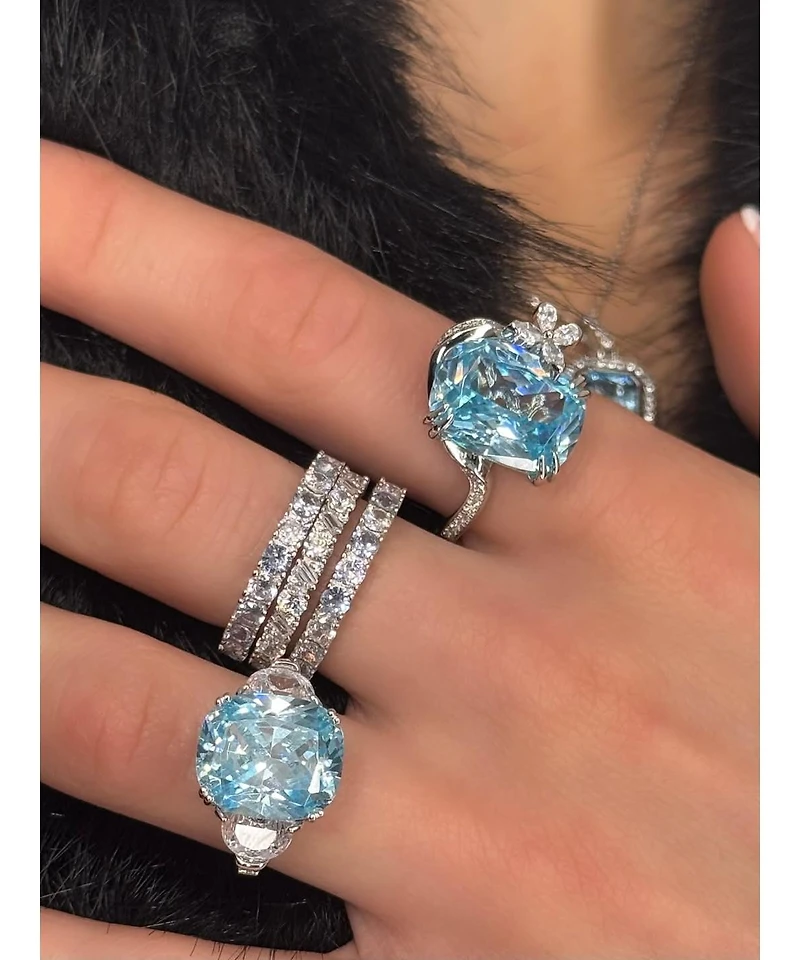 Suzy Levian New York Gala Collection Sterling Silver Elongated Cushion Firework Cut Cubic Zirconia Three Stone Ring