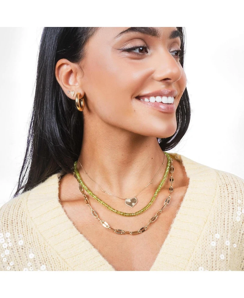 The Lovery Gold Tube Hoop Earrings 14K Gold 23 millimeters