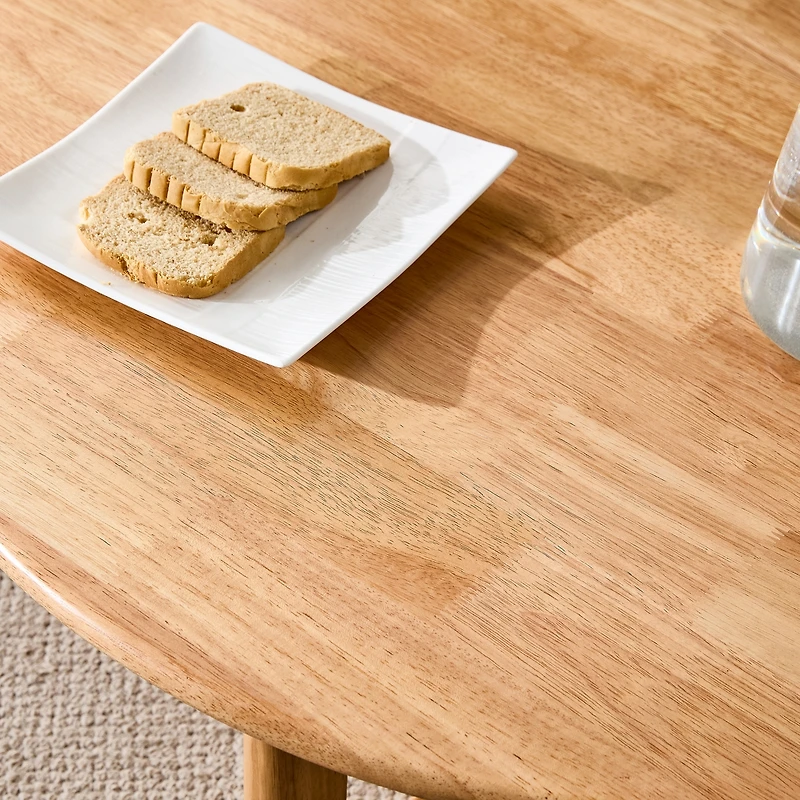 Elegant wooden coffee table with faux rattan accents