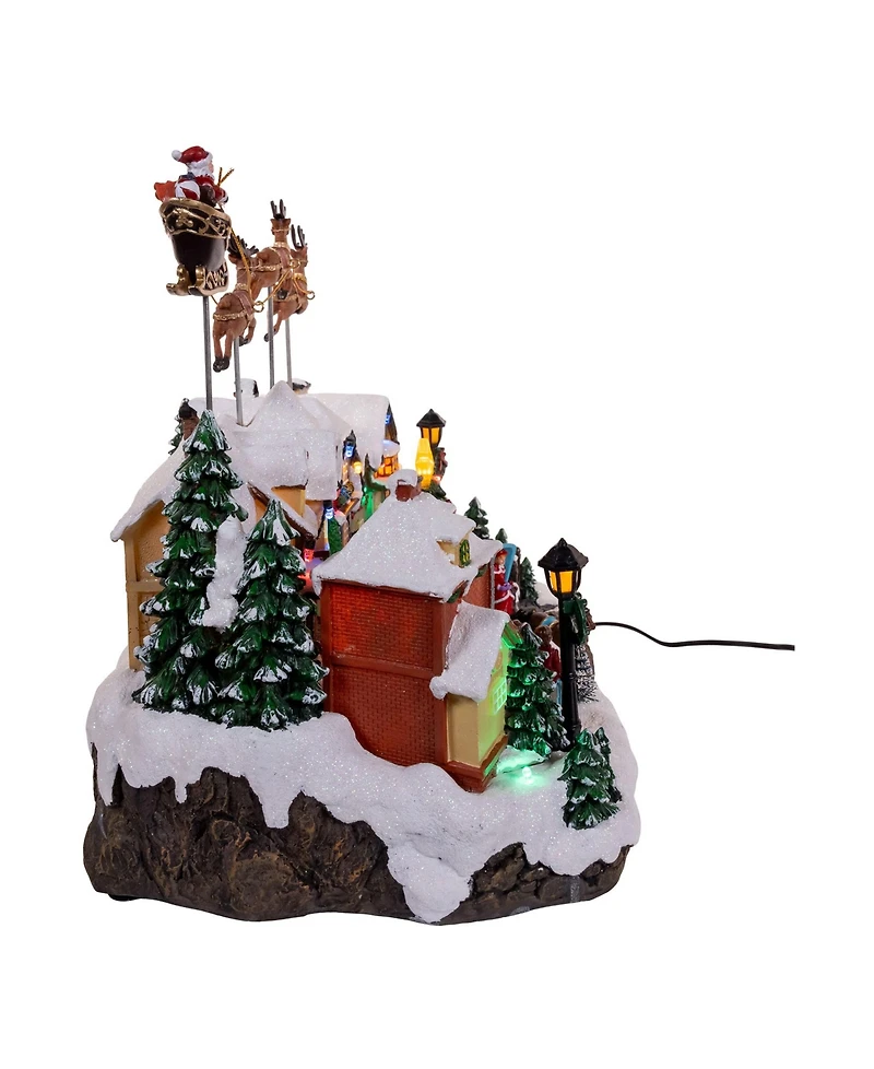 Kurt Adler 7.3-Inch Battery Operated Multicolor Led Lighted Musical Santa and Sleigh Table Piece