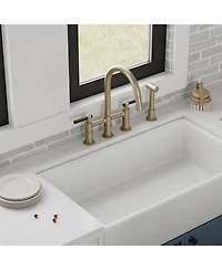 Double Handle 4-Holes Deck Mount Bridge Kitchen Faucet with Side Sprayer Sink Faucet 360 Swivel Spout in Brushed Gold