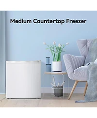Zafro 1.1 Cu. Ft. Small Upright Freezer – This compact mini freezer features removable shelves, an adjustable thermostat, and a reversible door