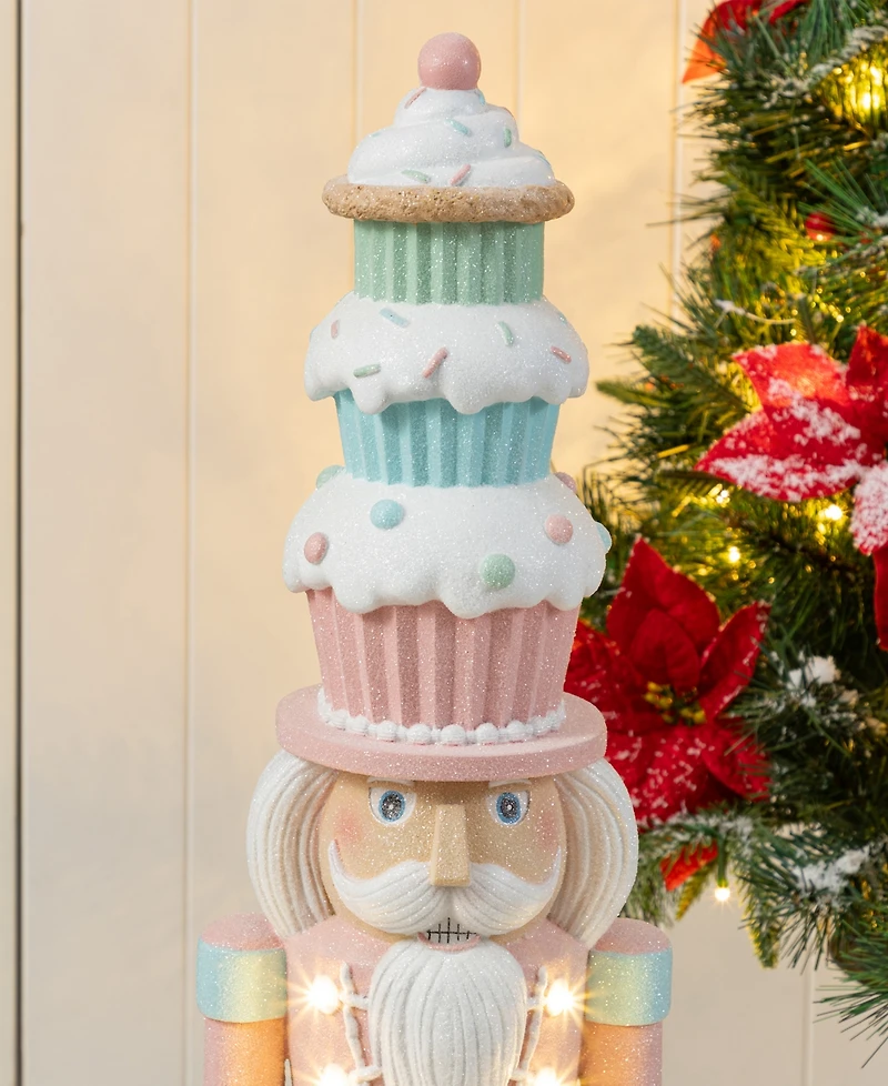 Glitzhome 28" Lighted Macaron Resin Christmas Cupcake Nutcracker Porch Decor