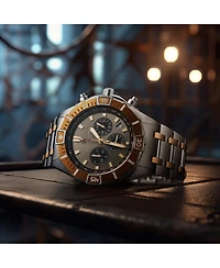 Stuhrling 1022 Men s Chronograph Watch Quartz Movement Gunmetal Dial Black Subdials Black Bezel Two Tone Stainless Steel Bracelet 50M Water Resistant