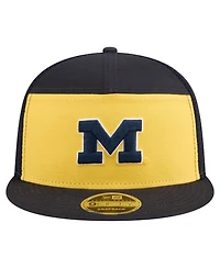 New Era Men's Black/Maize Michigan Wolverines Outdoor Wide Panel 9FIFTY Snapback Trucker Hat