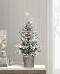 Puleo Pre-Lit Flocked Table Top Artificial Christmas Tree with 35 Lights in Metal Pot, 2'