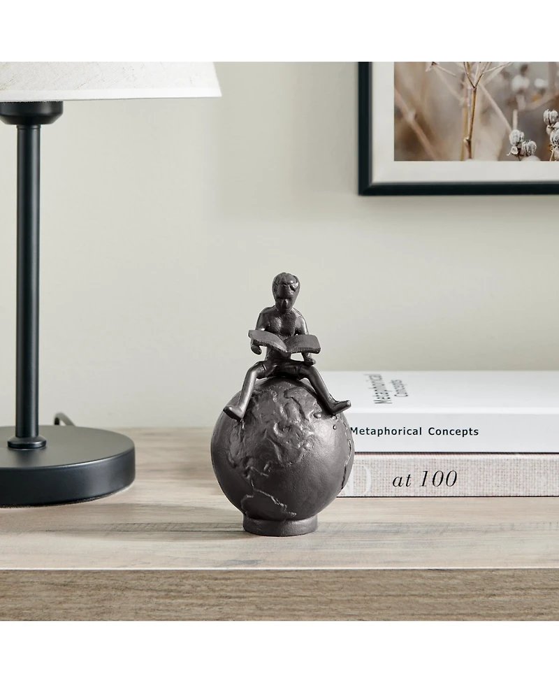 Danya B Brown Cast Iron Boy Reading on Globe Sculpture