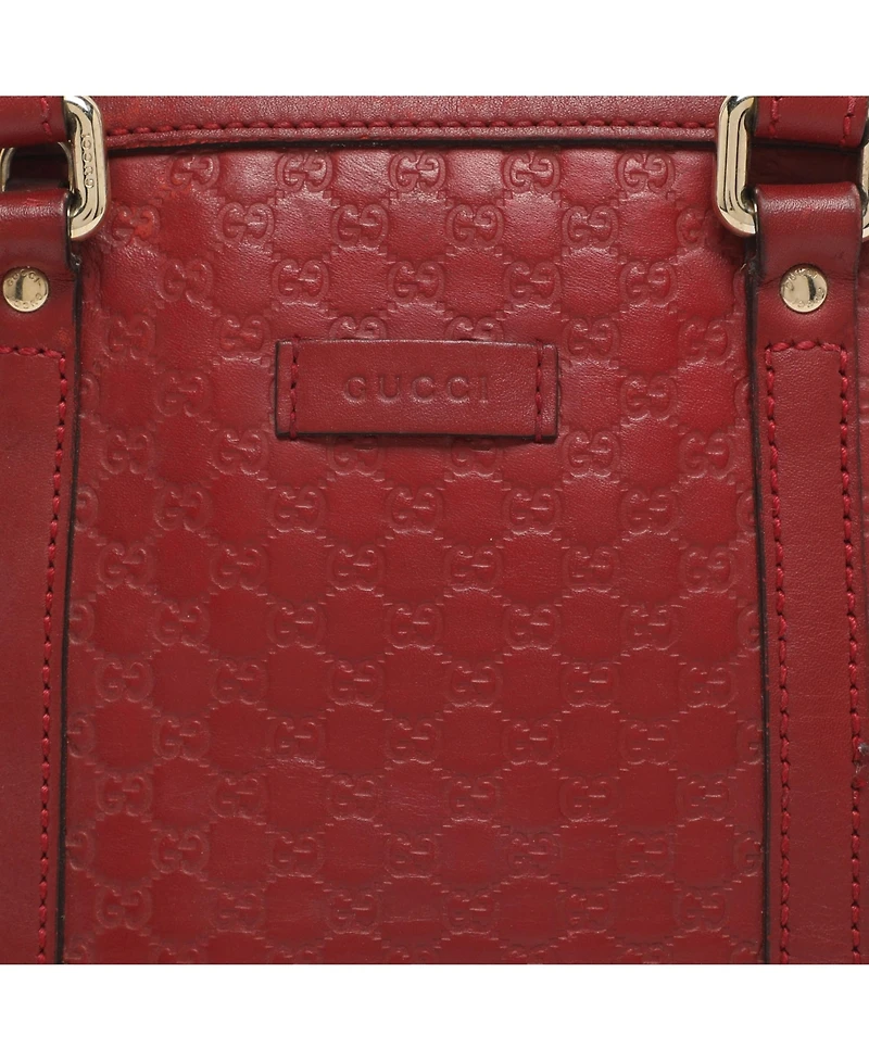 Pre-Owned Gucci women's Mini Microguccissima Leather Dome Satchel