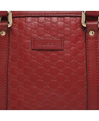 Pre-Owned Gucci women's Mini Microguccissima Leather Dome Satchel