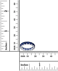 Created Blue Spinel Princess Cut Eternity Band Rhodium Plated Sterling Silver