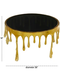 Rosemary Lane Aluminum Drip Coffee Table with Melting Designed Legs and Shaded Glass Top, 36" x 16"
