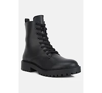 forter faux leather lace up boots