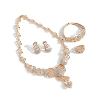 Sohi Women's Gold Embellished Intricate Necklace, Earrings, Bracelet And Ring (Set Of 4)