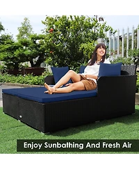 Skonyon Spacious Outdoor Rattan Daybed with Upholstered Cushions and Pillows