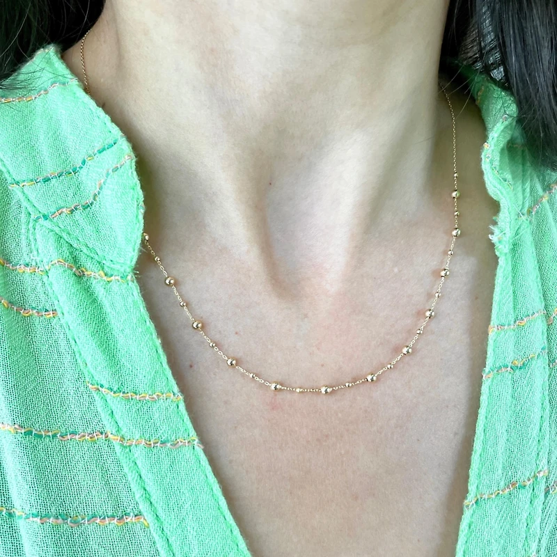 The Lovery Gold Bead Station Chain Necklace