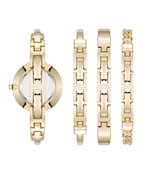 Anne Klein Women's Quartz White Enamel and Gold-Tone Metal Alloy Bangle Watch Set, 32mm