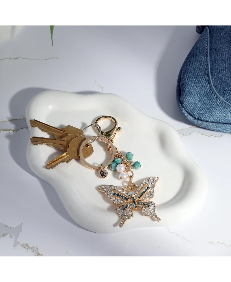Jessica Simpson Butterfly Charm Keychain – Elegant Gold-Tone with Blue Accents