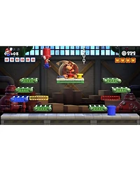 Nintendo Switch White Oled Console with Mario vs. Donkey Kong, MightySkins Console and Controller Skin Voucher