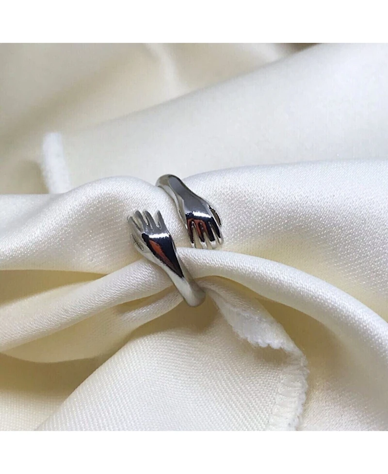 Spero London Hug Ring With Hands Sterling Silver and Gold Plated