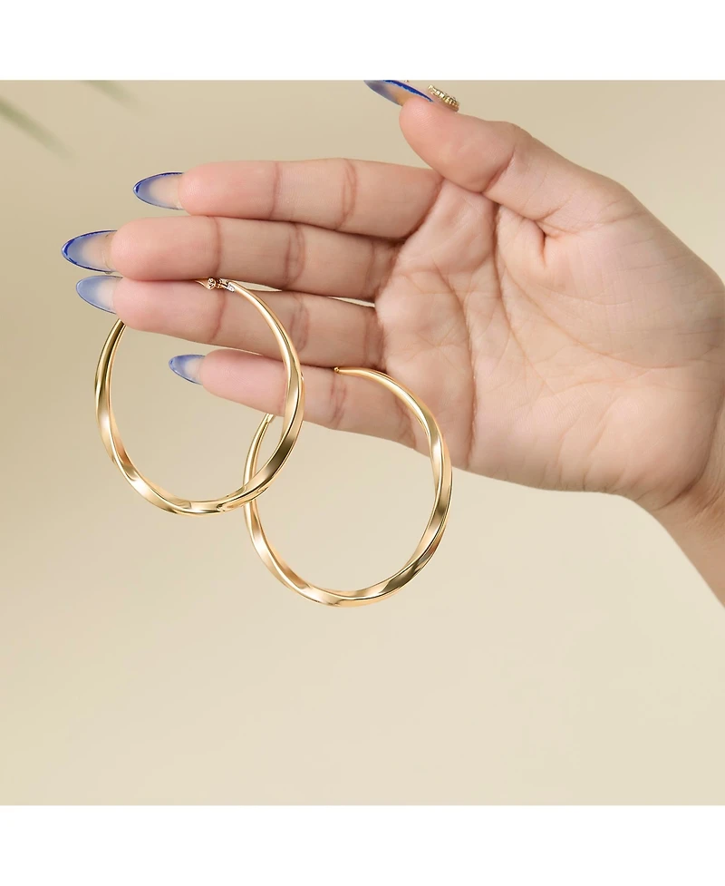 Jessica Simpson Twisted Gold Hoop Earrings