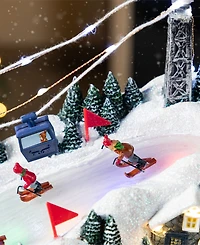 Glitzhome 16" Christmas Oversized Resin Lighted Musical Skiing Village