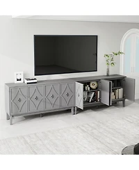 Streamdale Furniture Vintage 4-door cabinet with hand-carved geometric doors and adjustable shelves