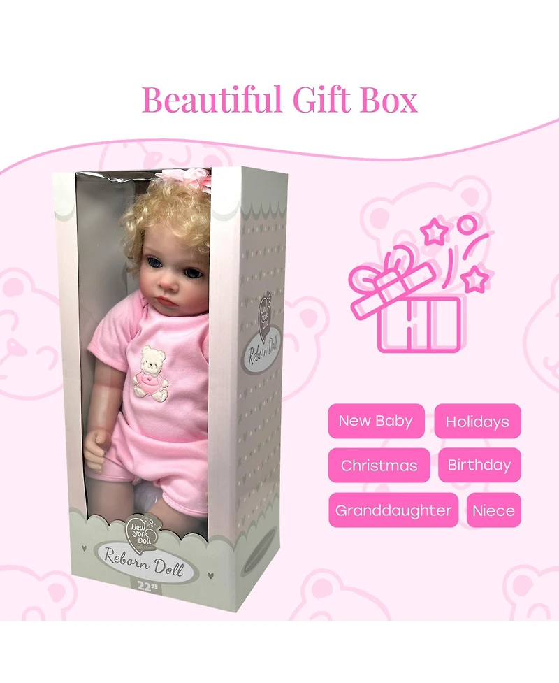 The New York Doll Collection 22 inch reborn baby doll with blond curly hair outfit/hairband