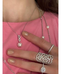 Suzy Levian Sterling Silver Pearl and White Sapphire Infinity Pendant