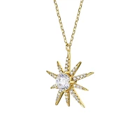 Radiant 14k Gold Plated Starburst Pendant Necklace with Cubic Zirconia