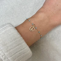The Lovery Mini Gold Peace Charm 14K Gold